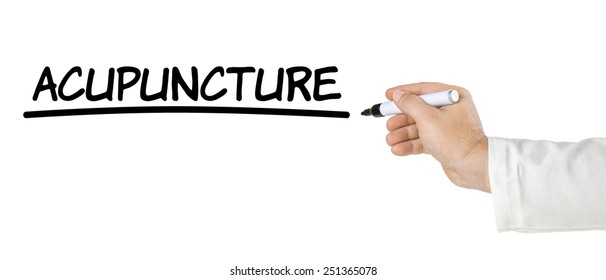 Hand with pen writing Acupuncture