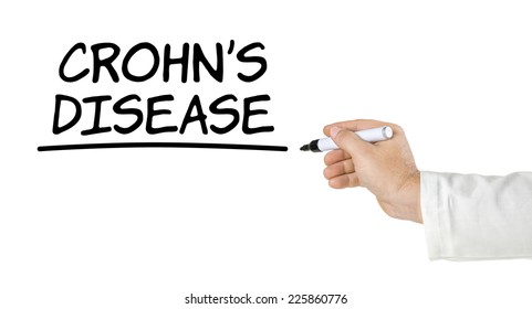 Hand With Pen Writing Crohns Disease