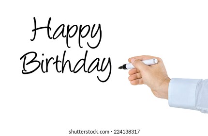 Hand with pen writing Happy Birthday