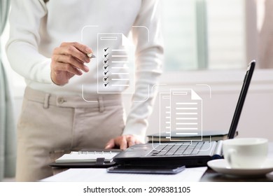 Hand of people check list on document icon to management data record system, Document management system concept - Shutterstock ID 2098381105
