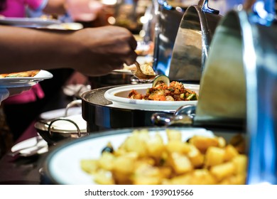 Hand Of People Grab Buffet Food Self Serving In Hotel Seminar Conference