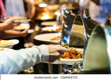 Hand of people take buffet food in hotel party, Food and drink