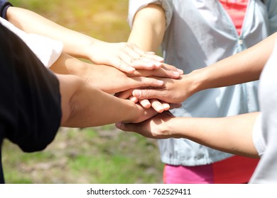 Hand of people working assemble corporate meeting show symbol Join forces teamwork quality and effective.Concept organizational development in teamwork and business - Shutterstock ID 762529411