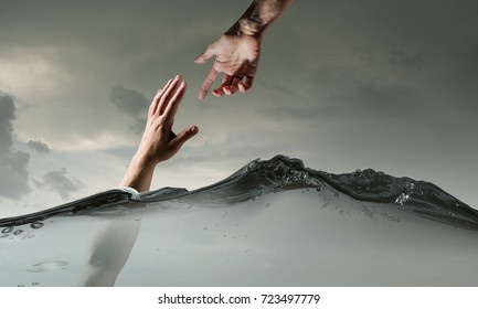 Hand Of Person Drowning In Water