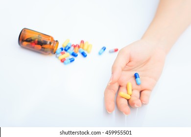 Hand of a person who comitted suicide with sleeping tablets