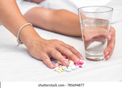 Hand of a person who committed suicide with sleeping tablets