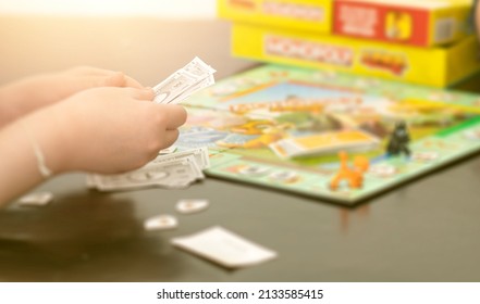 Hand Pick Board Game By Child With Fun