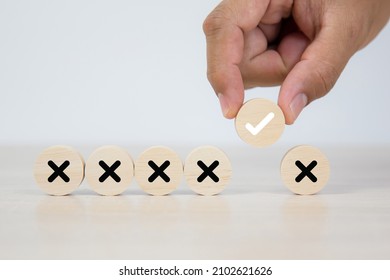 Hand Picked Check Mark On Cube Wooden Toy Block Stacked With Cross Symbol For True Or False Changing Mindset Or Way Of Adapting To Change Leader And Transform Quiz Answer And Poll Concept.