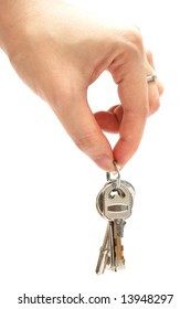 Hand Picking Up A Bunch Of Keys On White Background.