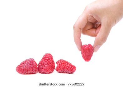 Hand Picking Up A Raspberry Isolated 