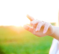 Friendship in the Palm of your Hand - Female hand outstretched and ...