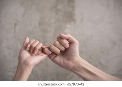 Hand to pinky swear, pinky promise hand signs. - Shutterstock ID 657870742