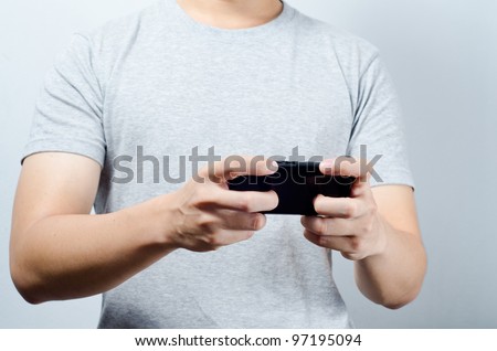 Hand play game on mobile phone