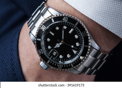 Hand In Pocket With Wrist Watch In A Business Suit Close Up