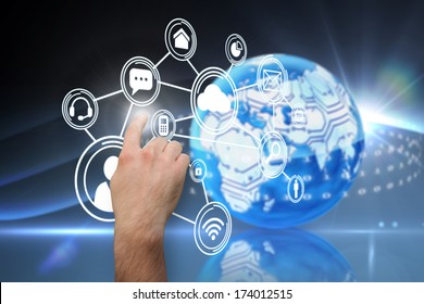 Hand pointing against digital earth background - Shutterstock ID 174012515