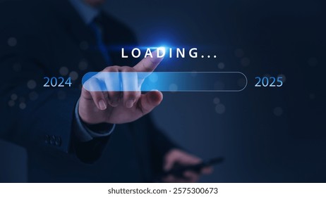 A hand pointing at a loading bar with a transition from 2024 to 2025 strategic planning, symbolizing progress and the future. - Powered by Shutterstock - Get 15% off with code: PIKWIZARD15