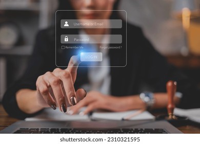 Hand pointing at log in button to enter company account data base. Safety, Protection, privacy of software. Online access protect password system. Cyberspace, hacker, iso 27001. Network system.
