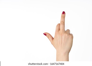 hand pointing up middle finger, concept of rude hand sign or hand gesture, studio isolated.