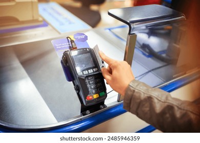Hand, pos machine and credit card for swiping, banking and account funds for access, money and debit. Fintech, person and cashless purchase with e commerce, payment or sale in digital scanner