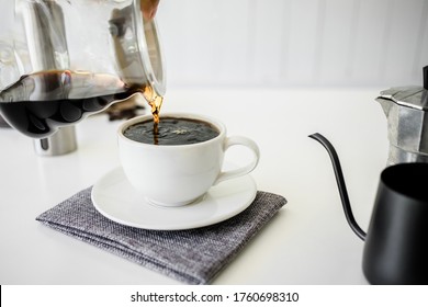 Hand  Poured Water Of Coffee  On Cup With Equipment, Tool Brewing On Bar At Kitchen Home