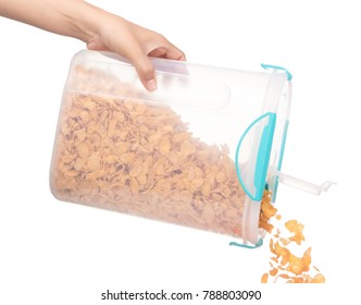 Hand Pouring Cereals From Container Box Isolated On White Background