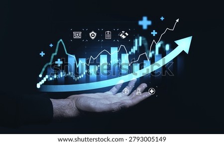 A hand presenting glowing financial bars and lines in modern graphic style on dark background showing business growth and technology concept