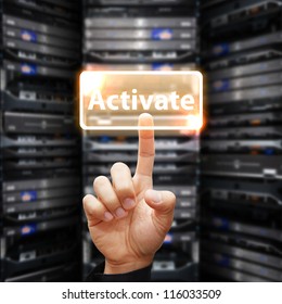 Hand Press On Activate Button In Data Center Room