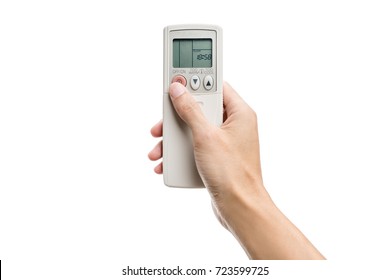 Hand Pressing Air Conditioner Remote Control Isolated On White Background