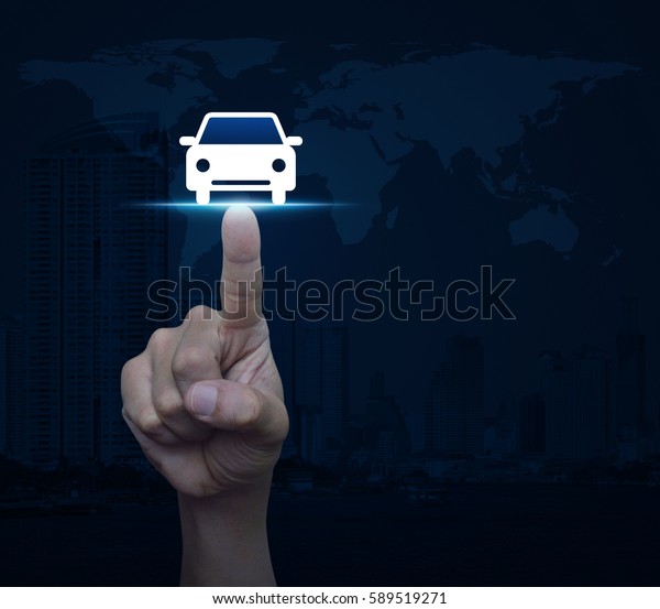 Hand pressing car front view flat icon\
over world map and modern city tower, Business transportation\
concept, Elements of this image furnished by\
NASA