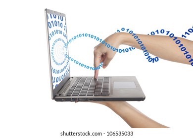 Hand pressing enter button on laptop computer keyboard with binary code stream out from the screen