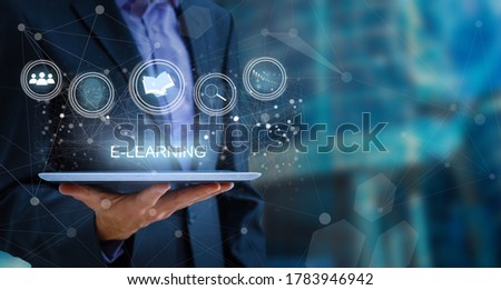 hand pressing learning word button. business concept. e learning
