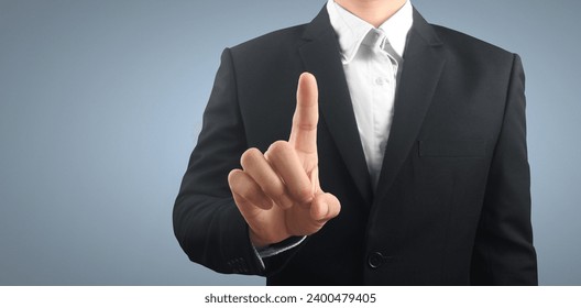 hand pressing a touchscreen button
