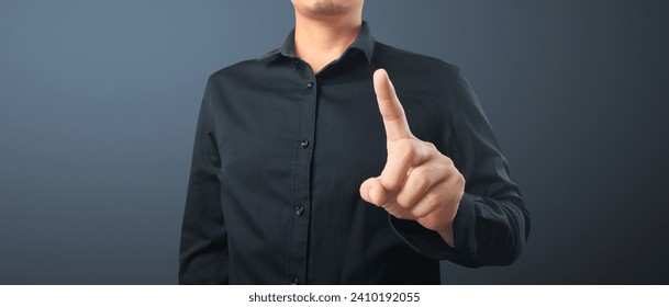 hand pressing a touchscreen button