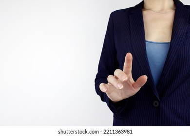 Hand pressing virtual button or pointing at something. Hand touching virtual screen, modern background concept - Powered by Shutterstock