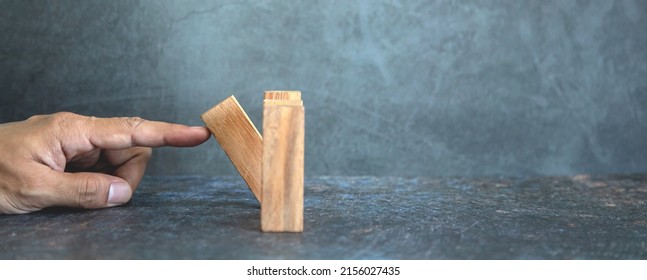 Hand Prevent Wooden Block Tower Stack Not Falling. Concept Of Prevention Of Financial Business And Risk Management Or Strategic Planning.