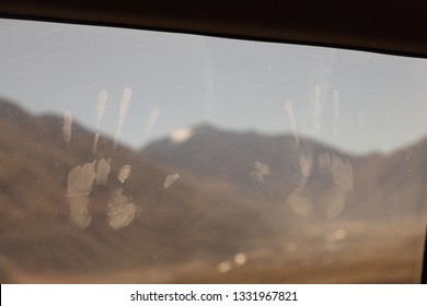 Hand Print On A Steamy Window