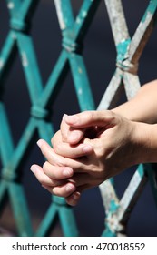 hand of prisoner in jail - Shutterstock ID 470018552
