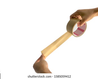 A Hand Pulling A Brown Packing Tape. 