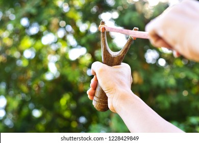 Hand pulling slingshot