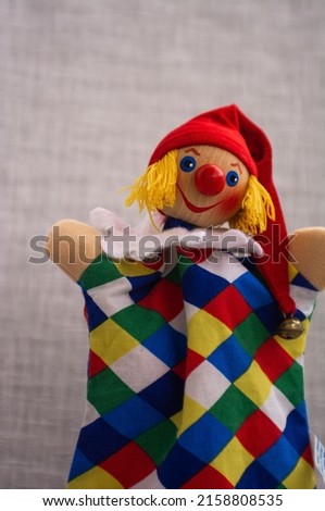 Hand puppet clown jester close up, puppet theatre