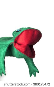 Hand Puppet Of A Funny Green Frog Isolated On White Background.