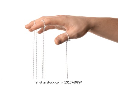 Hand of puppeteer on white background