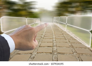 hand pushing a button touch screen