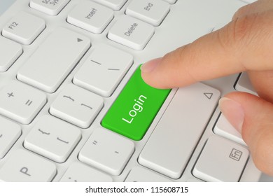 Hand Pushing Green Login Keyboard Button