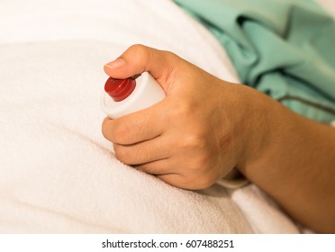 hand pushing nurse call button, Hand pressing emergency nurse call button, Call nurse button in hospital