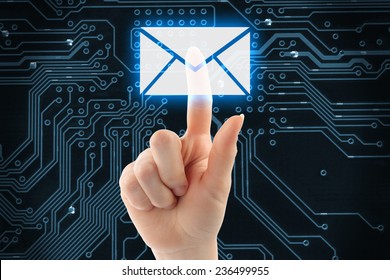 Hand pushing virtual mail button on digital background  