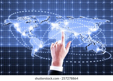 hand pushing world map interface on blue background