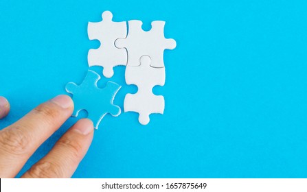 Hand Put Blue Piece White Puzzles Stock Photo 1657875649 | Shutterstock