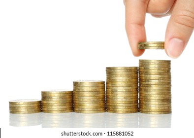 Hand Put Coins To Stack Of Coins On White Background