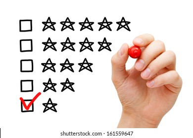 Hand putting check mark with red marker on poor one star rating.